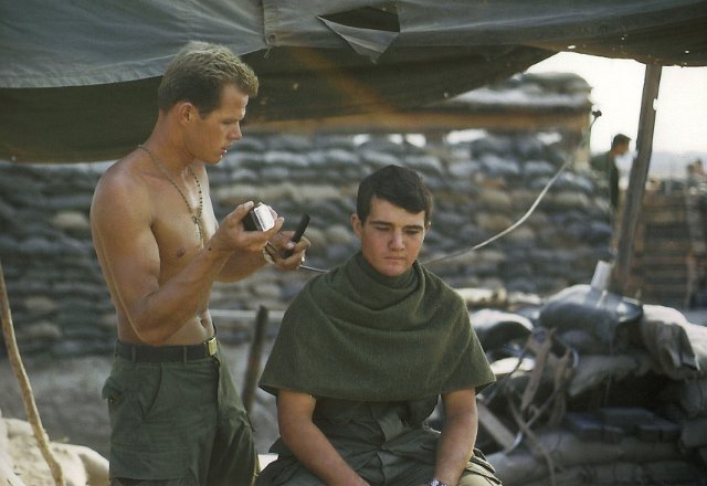 x Boston getting a haircut